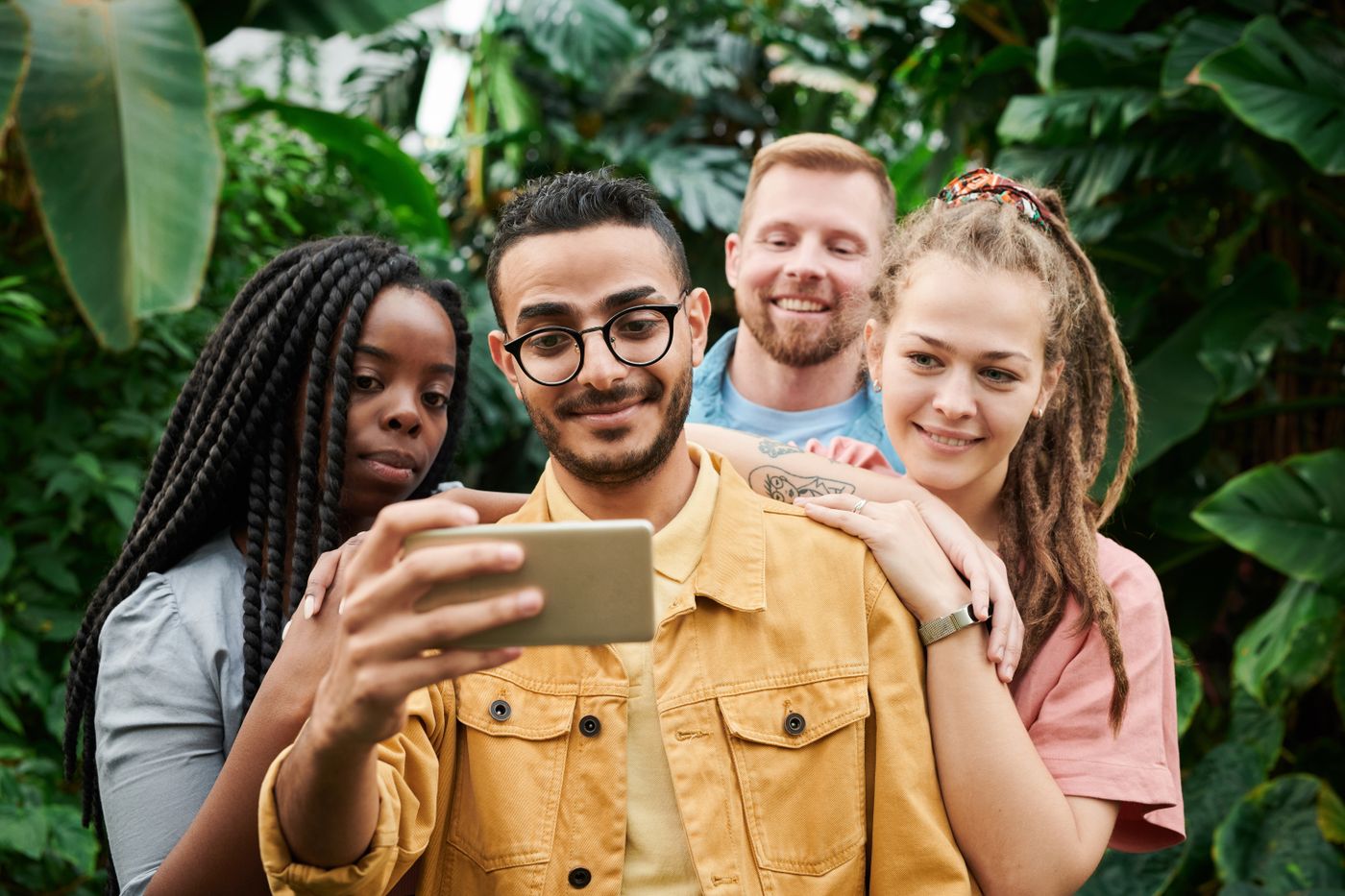 Young friends from different backgrounds taking a photo together